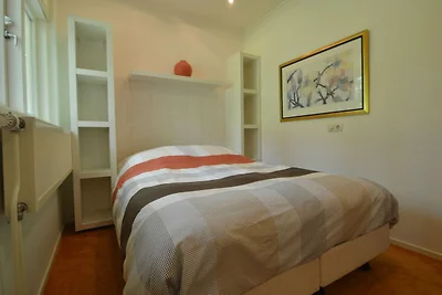 Vrijstaande bungalow met buitenhaard