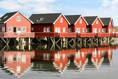 Rückzugsort am Meer mit Booten und Angeln