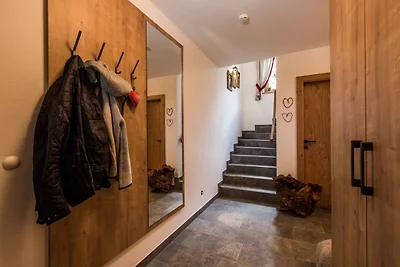 Luxe chalet met vier badkamers, bij een...