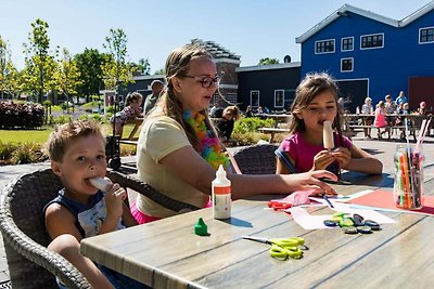 Chalet met sfeerhaard vlakbij een strand