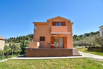 Ferienhaus in Veli Iz mit umzהuntem Garten