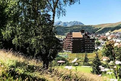 Wohnung in Huez mit Ski-In/Ski-Out-Zugang