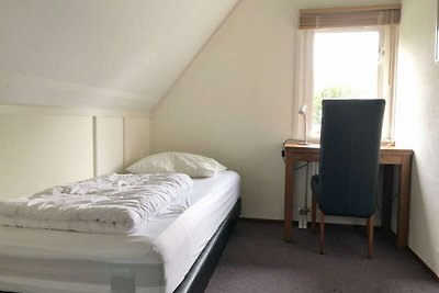 Schönes Ferienhaus mit Kamin in einem Ferienp...