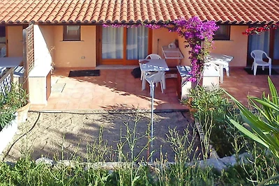 Ferienhaus in Porto Pollo mit Garten