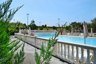 Reihenbungalow in einem Feriendorf Lido del M...