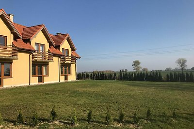 Aangenaam vakantiehuis in Wolin met een tuin