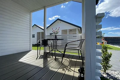 Eingeschossige Ferienhäuser mit Terrassen