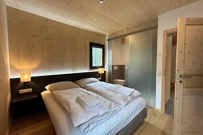 Chalet con vasca idromassaggio sul balcone