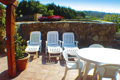 Ferienhaus in Porto Pollo mit Garten
