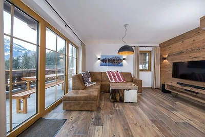 Luxe chalet met vier badkamers, bij een...