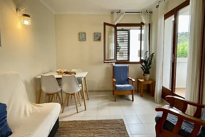 Appartamento Cala Montgo con piscina