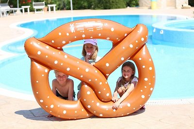 Appartamento con piscina comunale