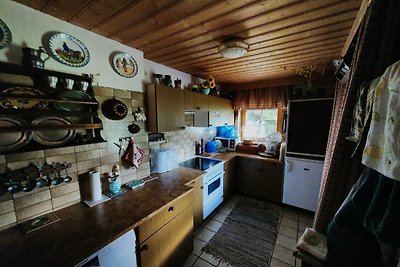 Idyllische hut met sauna