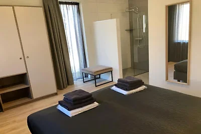 Lodge im Erdgeschoss mit privater Veranda