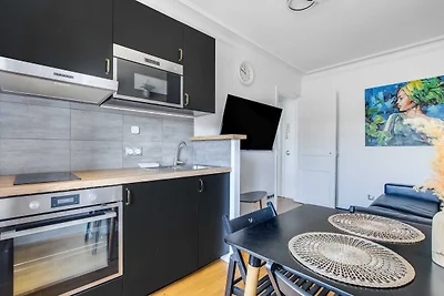 Modern appartement met 1 slaapkamer en 4 plaa...