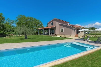 Holiday home in Tinjan with swimming pool