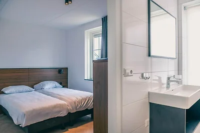 Duurzame watervilla met sauna, bij het...