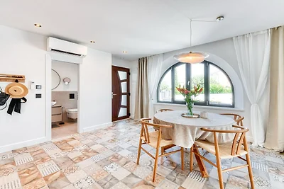 Appartement met zwembad en bubbelbad