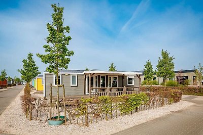 Chalet mit Terrasse am See und Strand