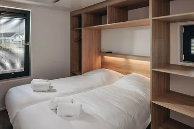 Modernes Tiny House mit Spülmaschine, Strand ...