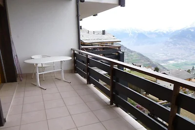 Grazioso appartamento con vista collina