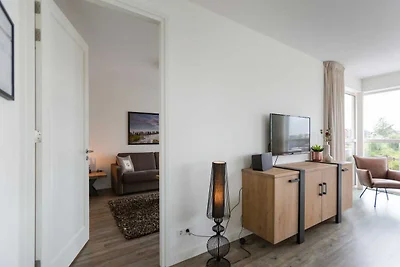 Villa mit Strohdach mit einer Sauna in...