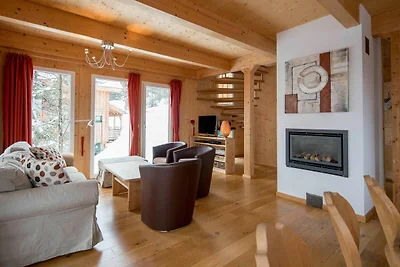 Chalet attraente con vasca idromassaggio