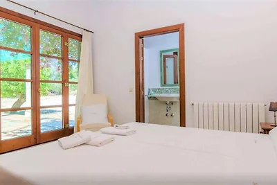 Appartement met overloop tuin en zwembad