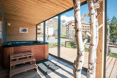 Chalet con vasca idromassaggio in terrazza