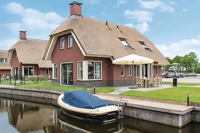 Villa mit Sauna, in einem Ferienpark am...
