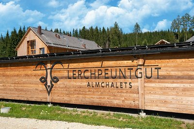 Chalet in Wölting met natuurlijke zwemvijver