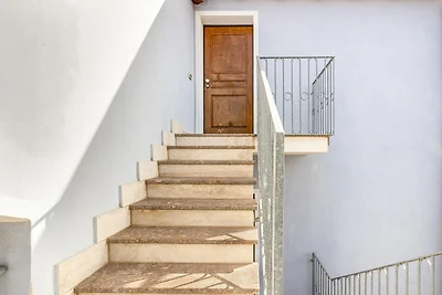 Apartment in Badesi mit Balkon