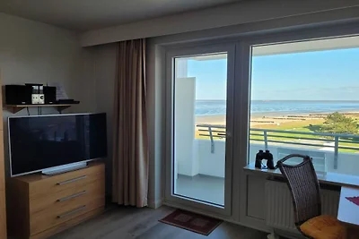 Stylishly located in a prime beachfront...