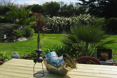 Casa con giardino tropicale vicino alla costa
