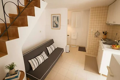 Haus in Lefkes mit Blick auf das Dorf