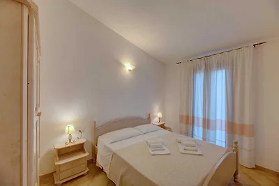 Appartamento con piscina nel Residence Badus