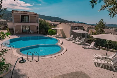Appartamento a Badus con piscina comune