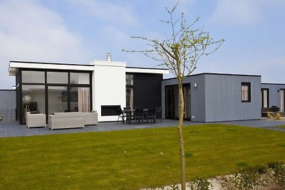 Chalet met sfeerhaard vlakbij een strand