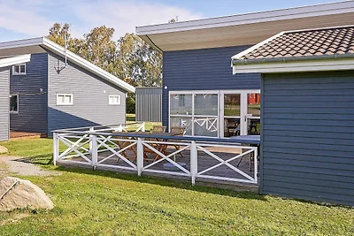 6 person holiday park home in Gudhjem
