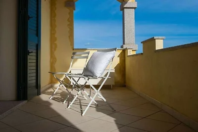 Ferienhaus in Telti mit Terrasse