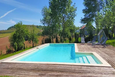Affascinante casa con piscina a Coubejours