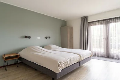 Wohnung in Hollum mit Schwimmbecken