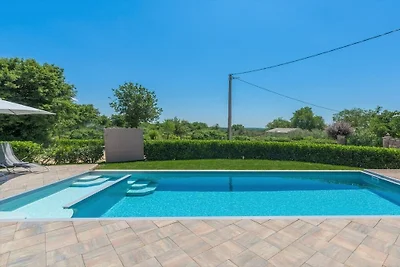 Holiday home in Tinjan with swimming pool