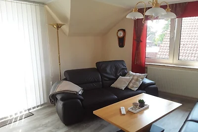 A in het huis in de rozentuin