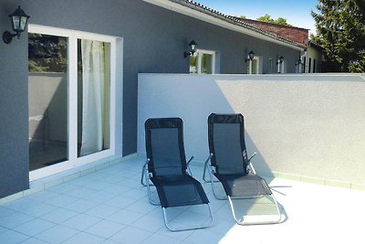 Appartements mit Terrasse am Kummerower See i...