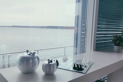 Schwimmendes Ferienhaus mit einer...