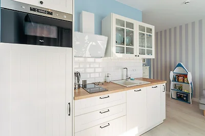 Wohnung in Grzybowo mit Garten