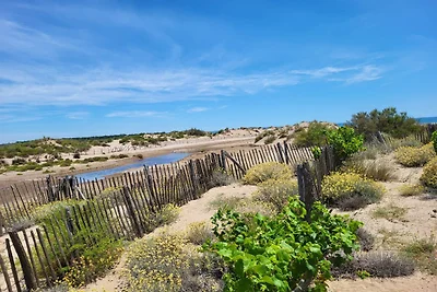 Begane grond appartement aan het strand