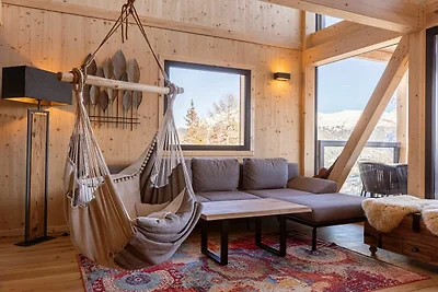 Chalet mit Sauna auf dem Balkon
