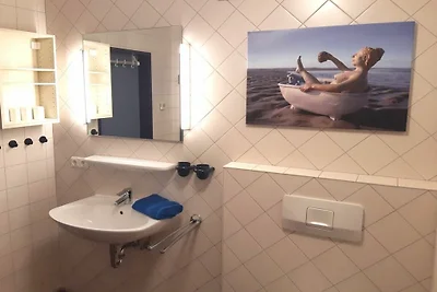 "Strandschoonheid" in het huis van Buttnase